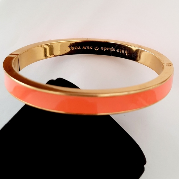 Kate spade coral sparky fly gold tone bangle